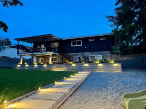 Modern 2-Bedroom Suite in Langley with Patio, Play Area & Mini Golf